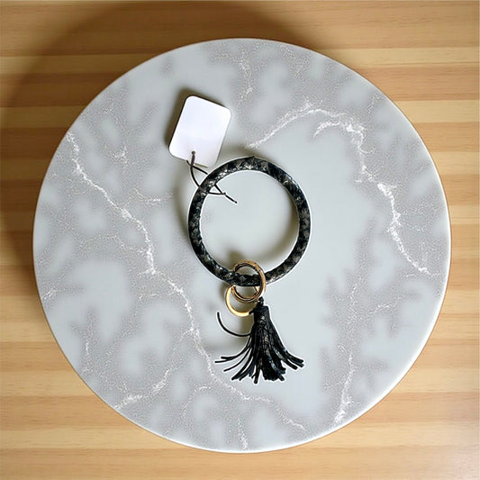 Porte-clés noir avec pompon